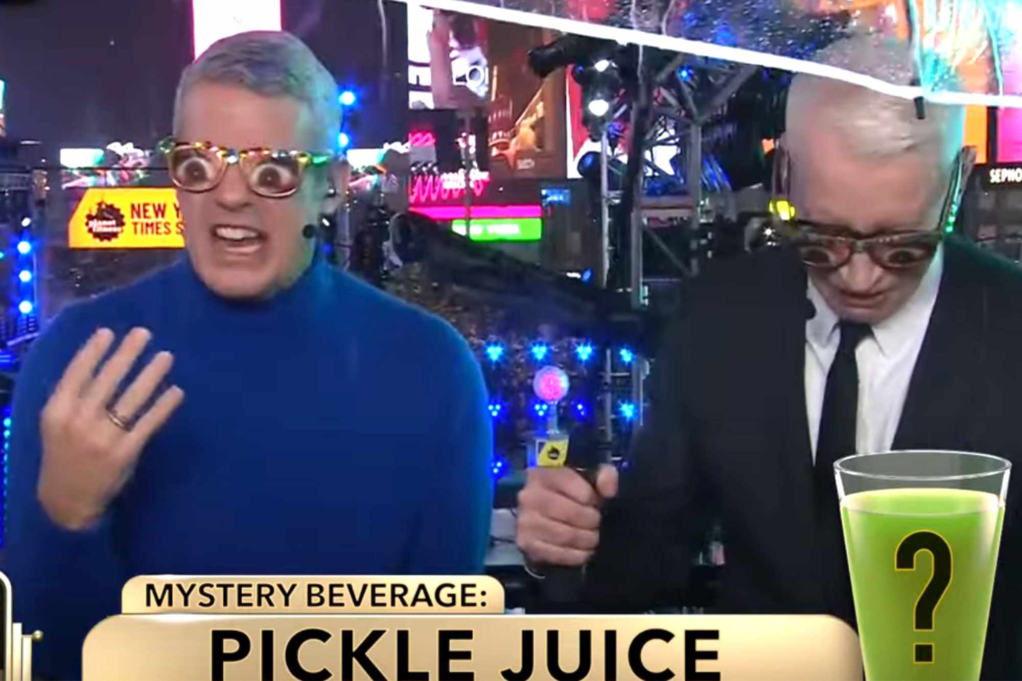 See Anderson Cooper and Andy Cohen take shots of mystery liquid