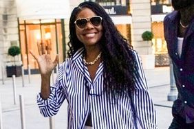  Superstar couple Dwyane Wade and Gabrielle Union are all smiles at they arrive at their hotel during the Olympics in Paris, France.