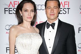 Angelina Jolie and Brad Pitt arrive at the 2015 AFI Fest opening night premiere of 'By The Sea'