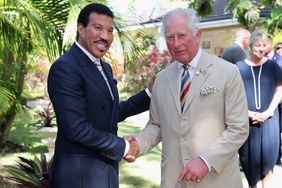 Prince Charles, Prince of Wales meets singer Lionel Ritchie at a Prince's Trust International reception