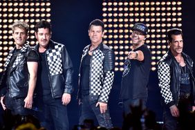 Joey McIntyre, Jonathan Knight, Jordan Knight, Donnie Wahlberg, and Danny Wood of New Kids on the Block perform in support of the band's "Mixtape" tour at Golden 1 Center on June 02, 2022 in Sacramento, California.