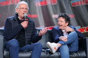 NEW YORK, NEW YORK - OCTOBER 08: Actors Christopher Lloyd (L) and Michael J. Fox attend a "Back To The Future Reunion" at New York Comic Con on October 08, 2022 in New York City. (Photo by Mike Coppola/Getty Images for ReedPop)