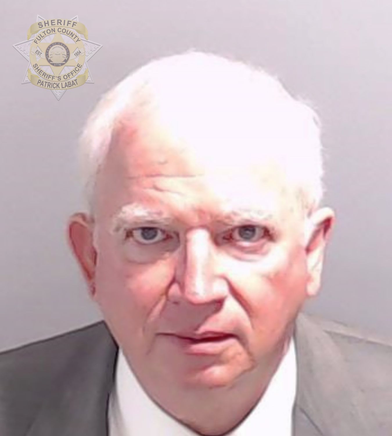 In this handout provided by the Fulton County Sheriff's Office, John Eastman, former lawyer to former U.S. President Donald Trump poses for his booking photo on August 22, 2023 in Atlanta, Georgia. 