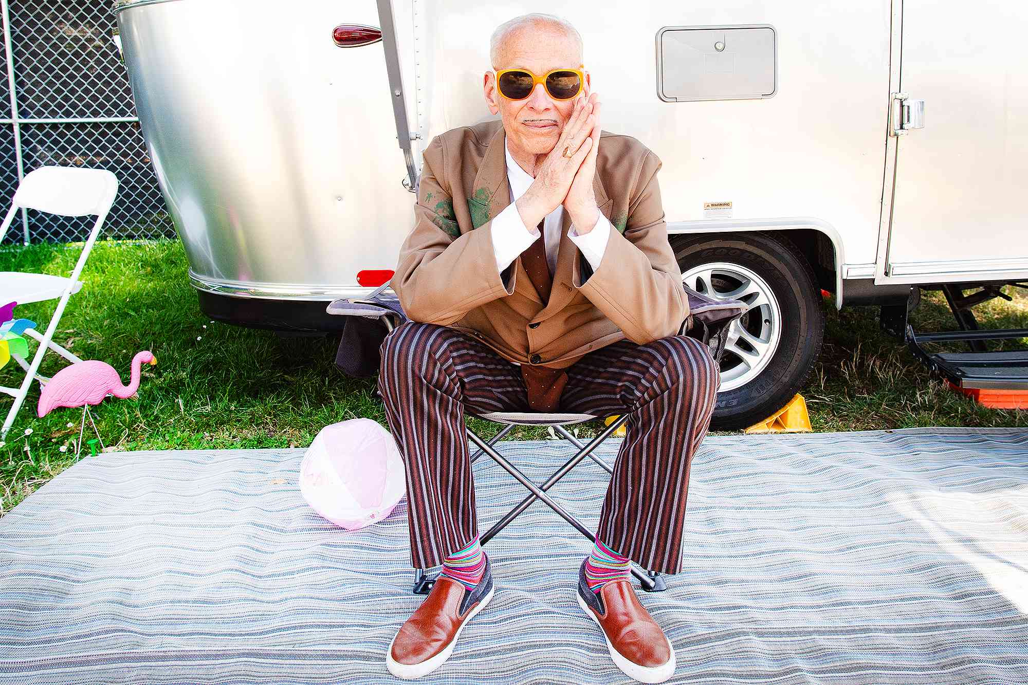 Host and curator John Waters keeps cool between sets during Day One of the Mosswood Meltdown in Oakland, California on July 6, 2024.