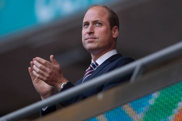 Prince William, The Duke of Cambridge and President of the Football Association applauds prior to the UEFA Euro 2020 Championship Semi-final match between England and Denmark at Wembley Stadium on July 07, 2021 in London, England