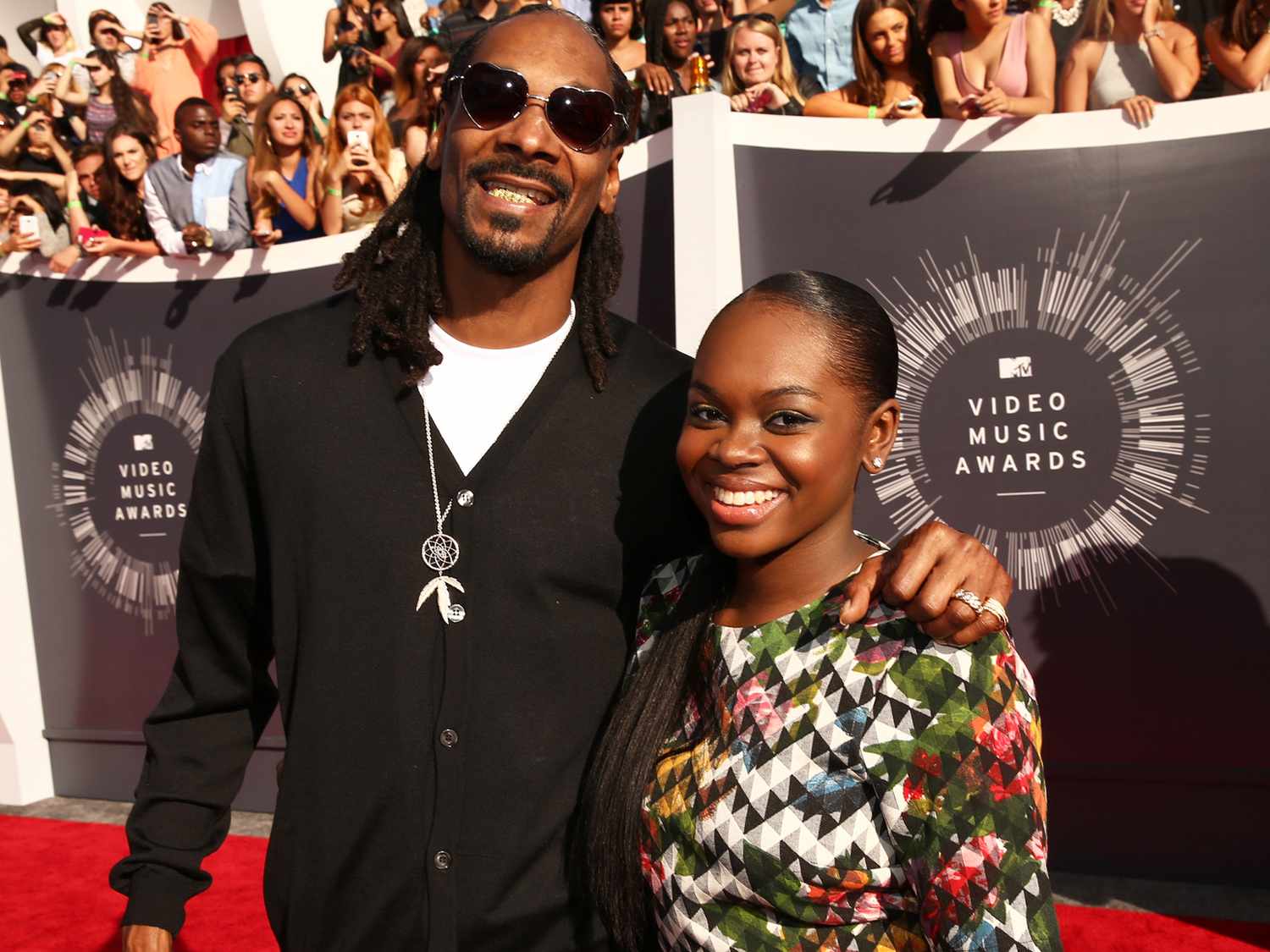 Snoop Dogg and Cori Broadus attend the 2014 MTV Video Music Awards on August 24, 2014 in Inglewood, California. 