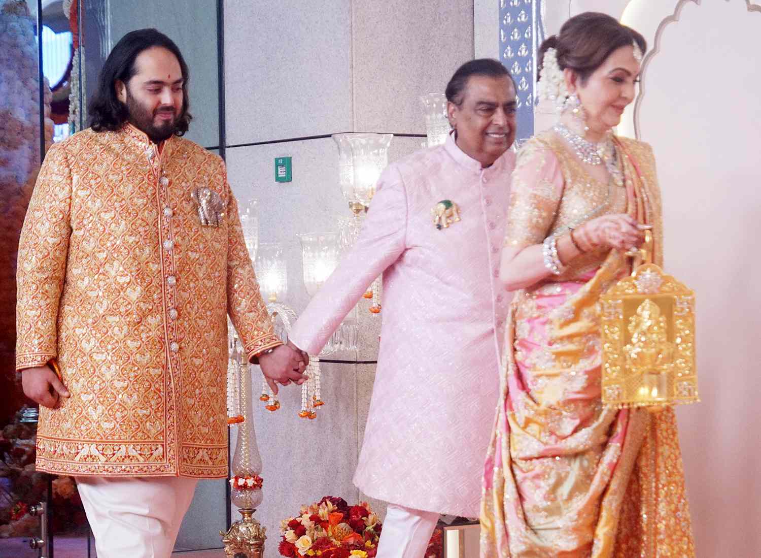 Mukesh Ambani and Nita Ambani Attend The Lagna Vidhi Of The Wedding Of Anant Ambani(L) & Radhika Merchant 