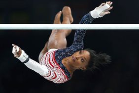 Simone Biles of the United States competes during the uneven bars event of the artistic gymnastics women's team final at the Paris 2024 Olympic Games in Paris, France, July 30, 2024. France Paris Oly Artistic Gymnastics - 30 Jul 2024