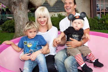 Gwen Stefani and Gavin Rossdale, with their children, Kingston, 4, and Zuma, 1, visit the Mad Tea Party attraction at Disneyland on July 7, 2010 in Anaheim, California