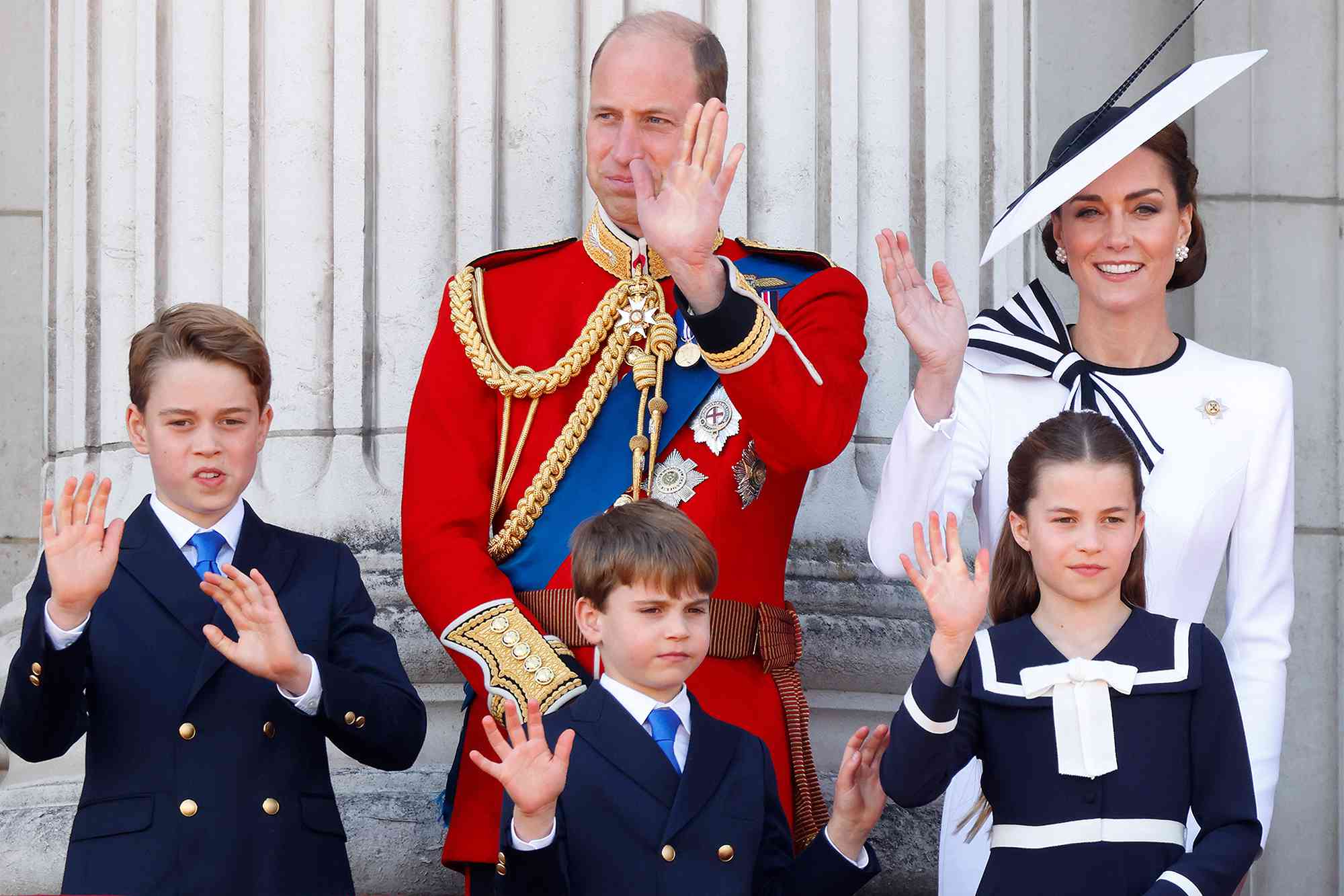 Prince George of Wales, Prince William, Prince of Wales (Colonel of the Welsh Guards), Prince Louis of Wales, Princess Charlotte of Wales and Catherine, Princess of Wales watch an RAF flypast from the balcony of Buckingham Palace after attending Trooping the Colour on June 15, 2024 in London