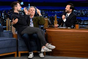 THE TONIGHT SHOW STARRING JIMMY FALLON -- Episode 1743 -- Pictured: (l-r) An audience member with actor Will Ferrell during an interview with host Jimmy Fallon on Thursday, November 10, 2022 -- (Photo by: Todd Owyoung/NBC via Getty Images)