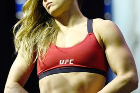 LAS VEGAS, NV - DECEMBER 29: Ronda Rousey poses on the scale during the UFC 207 weigh-in at T-Mobile Arena on December 29, 2016 in Las Vegas, Nevada. (Photo by Jeff Bottari/Zuffa LLC/Zuffa LLC via Getty Images)