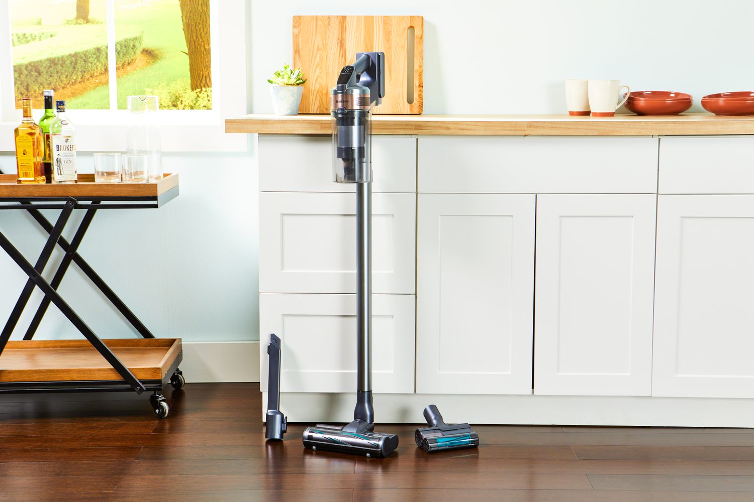 Samsung Jet 75 Cordless Stick Vacuum displayed next to a kitchen counter