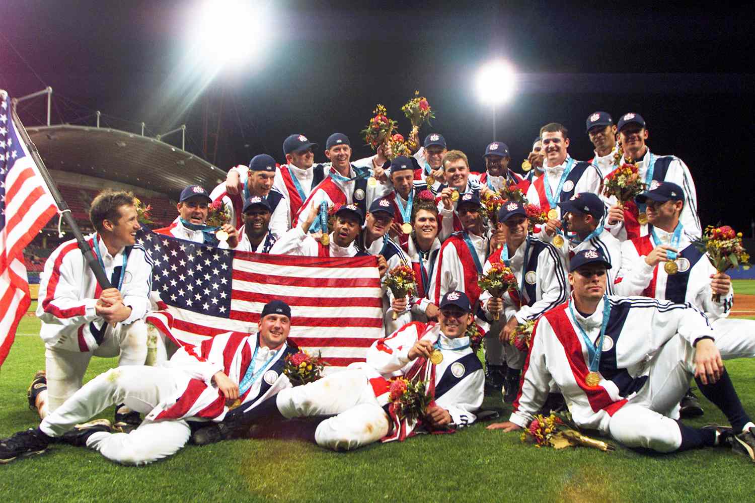 The US Olympic baseball team celebrate Gold Medal victory over Cuba at the XXVII Olympic Summer Games 27 September 2000 in Sydney.