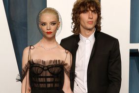 Anya Taylor-Joy and Malcolm McRae attend the 2022 Vanity Fair Oscar Party hosted by Radhika Jones at Wallis Annenberg Center for the Performing Arts on March 27, 2022 in Beverly Hills, California