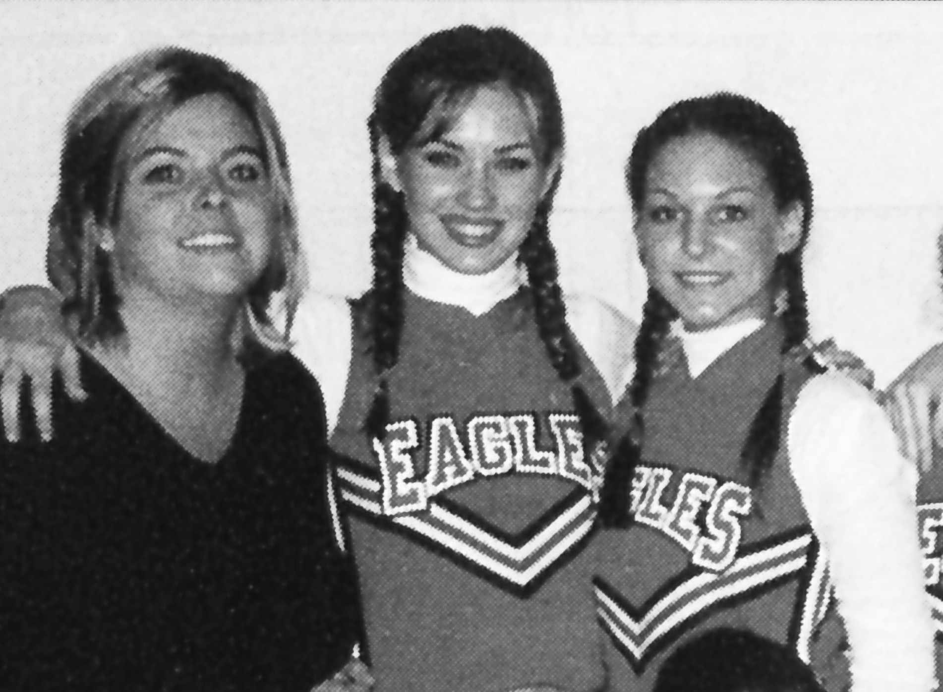 Megan Fox (center) cheerleading 2002 