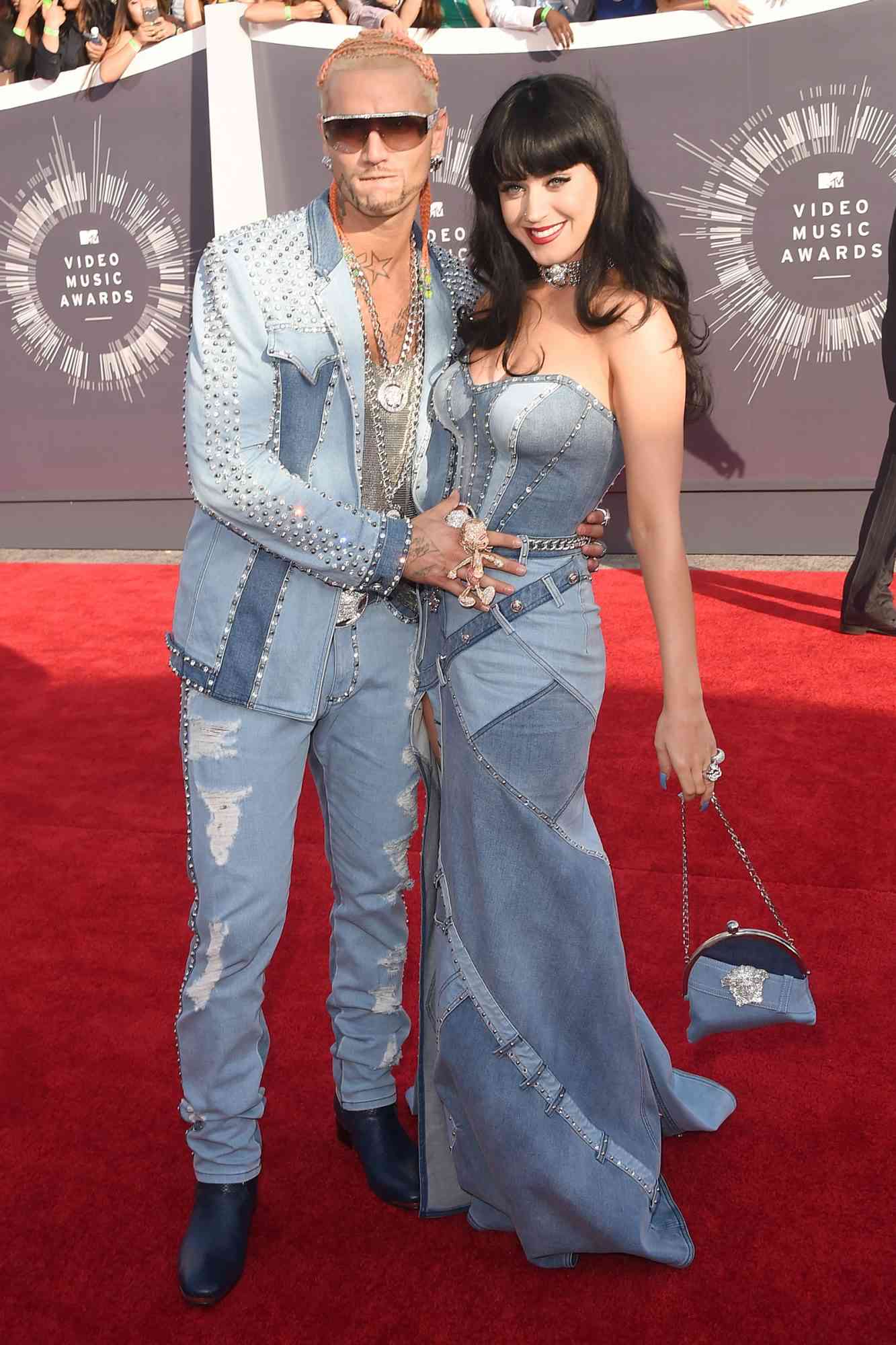 Katy Perry and Riff Raff at the VMA in 2014 wearing similar all-denim outfits.