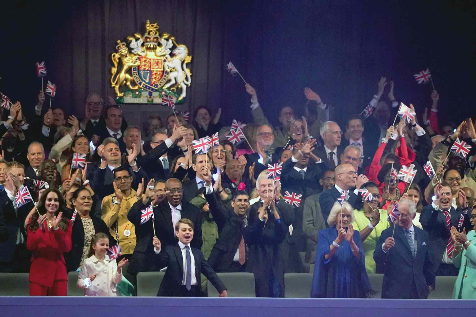 WINDSOR, ENGLAND - MAY 07: (L-R) Katharine, Princess of Wales, Princess Charlotte, Prince George, Prime Minister, Rishi Sunak, Akshata Murty, Queen Camilla and King Charles III in the Royal Box during the Coronation Concert on May 7, 2023 in Windsor, England. The Windsor Castle Concert is part of the celebrations of the Coronation of Charles III and his wife, Camilla, as King and Queen of the United Kingdom of Great Britain and Northern Ireland, and the other Commonwealth realms that took place at Westminster Abbey yesterday. High-profile performers will entertain members of the royal family and 20,000 guests including 10,000 members of the public. (Photo by Stefan Rousseau - WPA Pool/Getty Images)