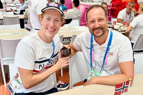  Crown Prince Haakon at the Paris Olympics with Norwegian swimmer Henrik Christiansen