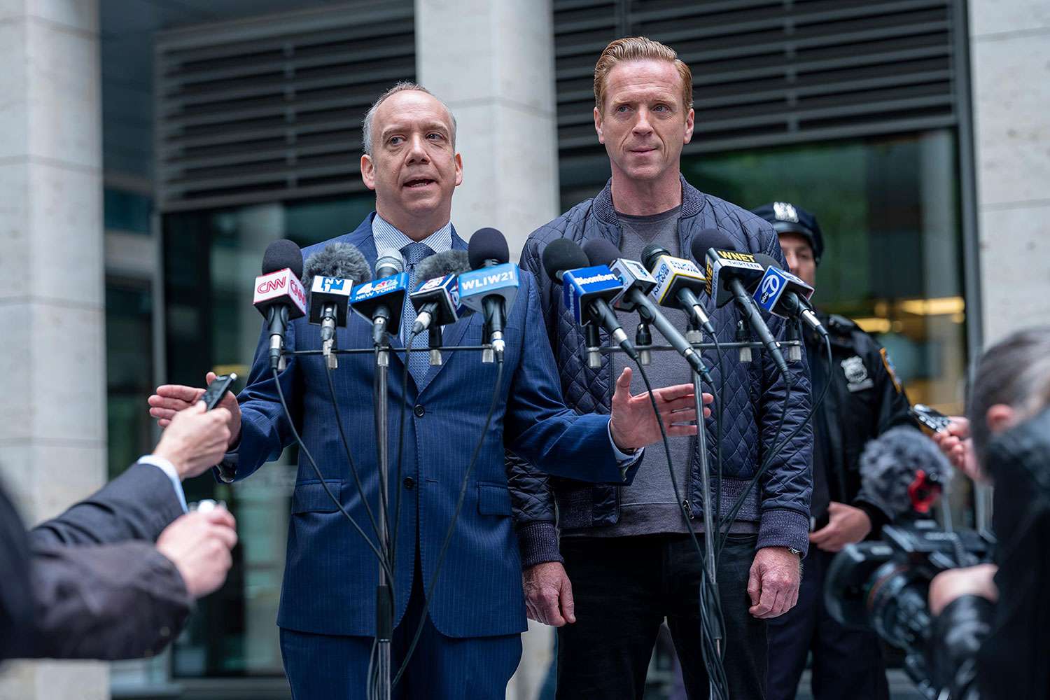 (L-R): Paul Giamatti as Chuck Rhoades and Damian Lewis as Bobby "Axe" Axelrod in BILLIONS No Direction Home. Photo Credit: Laurence Cendrowicz/SHOWTIME