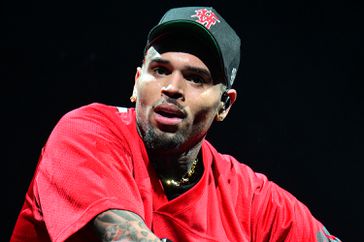 Chris Brown performs during Tycoon Music Festival at State Farm Arena on February 13, 2024 in Atlanta, Georgia