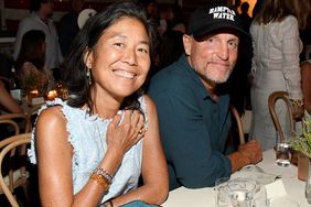 Laura Louie (L) and Woody Harrelson attend Apollo in the Hamptons 2019: Hosted by Ronald O. Perelman at The Creeks on August 03, 2019 in East Hampton, New York