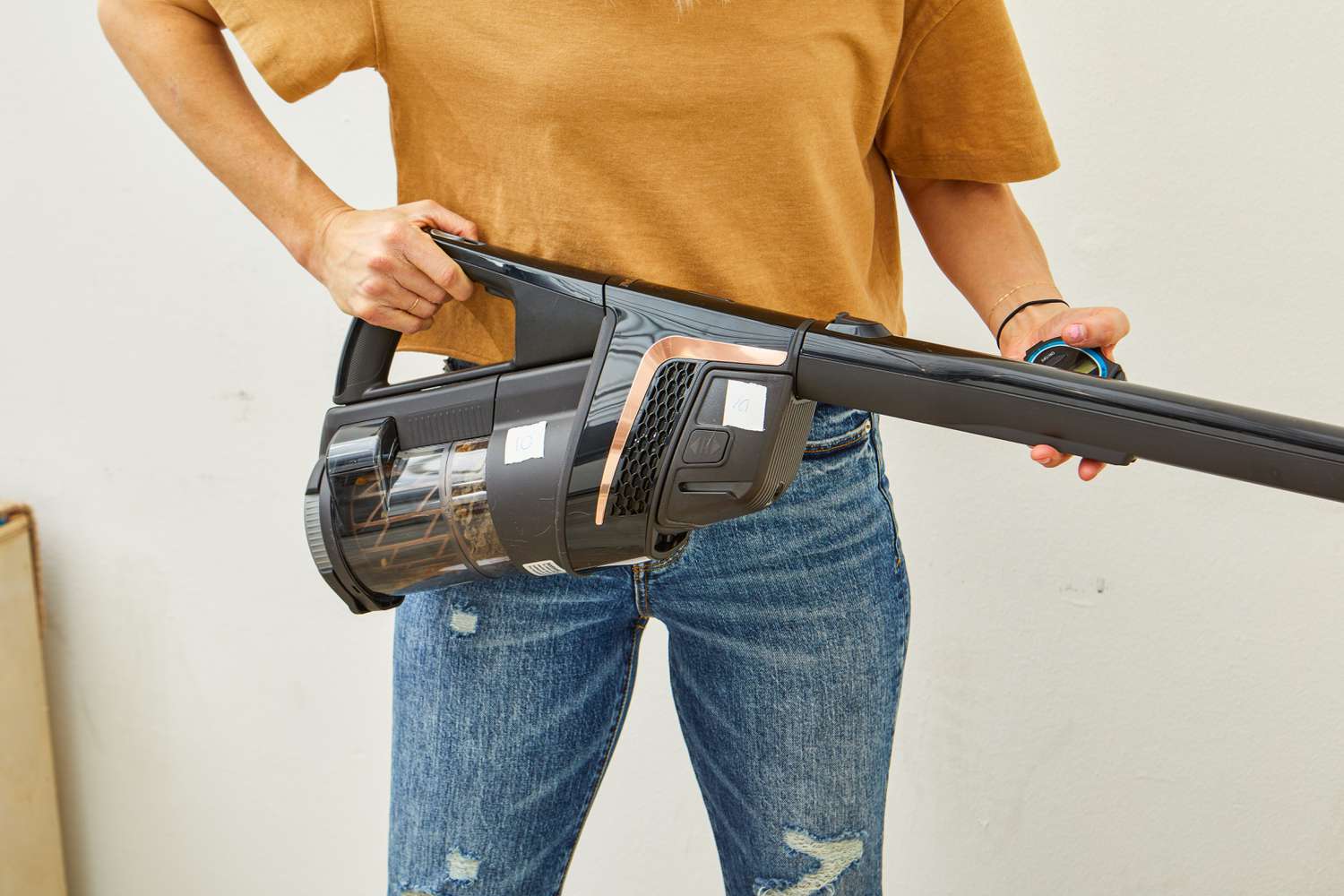 Person holding the Miele Triflex HX2 Cat & Dog Vacuum