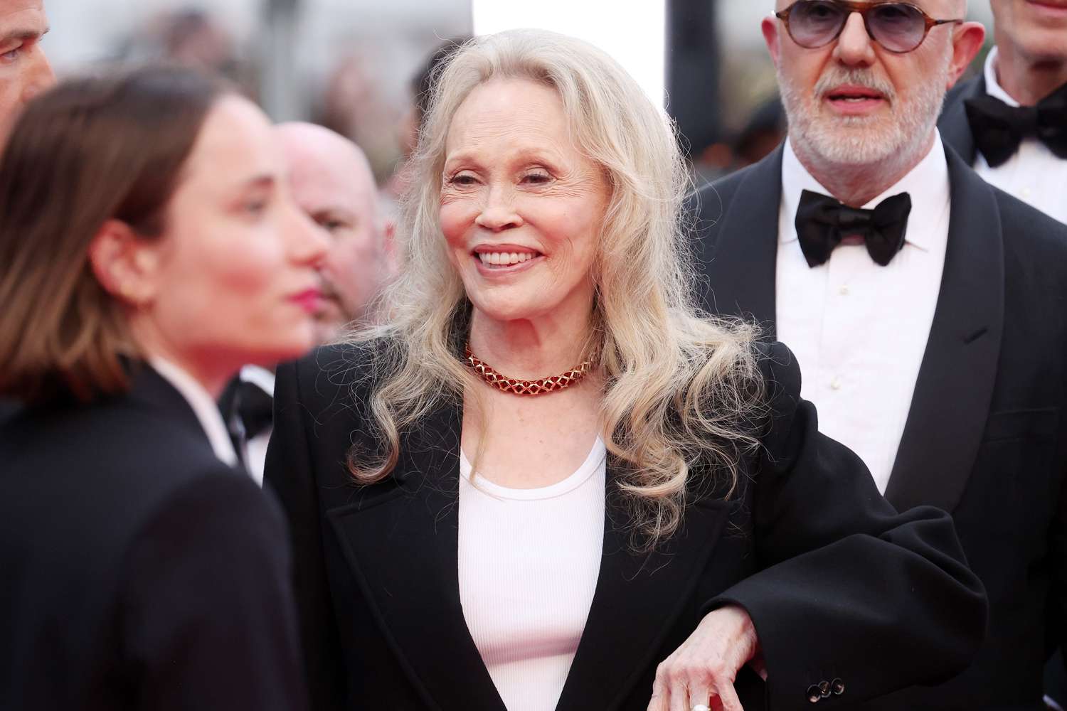 Faye Dunaway and Laurent Bouzereau attend the "Furiosa: A Mad Max Saga" (Furiosa: Une Saga Mad Max) Red Carpet at the 77th annual Cannes Film Festival at Palais des Festivals on 