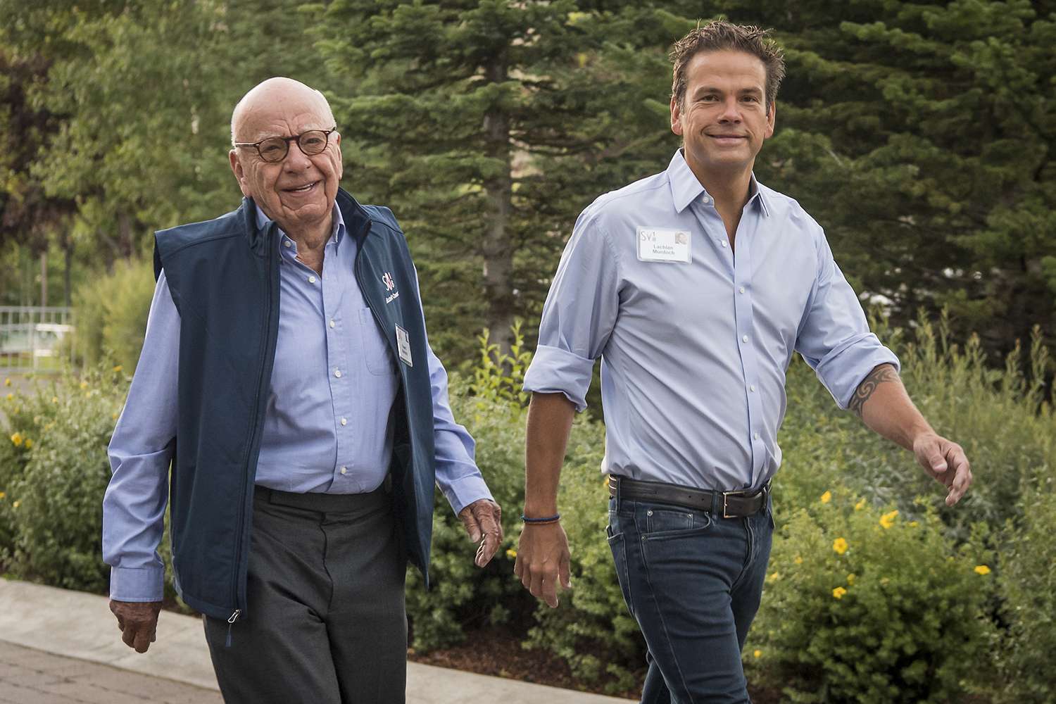 Rupert Murdoch, co-chairman of Twenty-First Century Fox Inc., left, and Lachlan Murdoch, co-chairman of Twenty-First Century Fox Inc., arrive for a morning session at the Allen & Co. Media and Technology Conference 