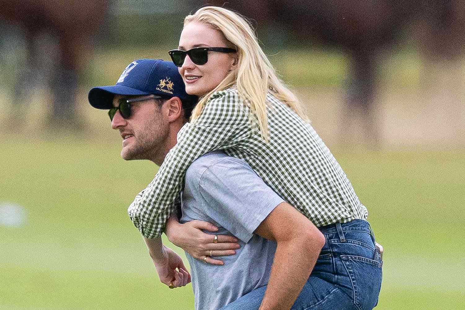 Actress Sophie Turner enjoys a relaxed family day with boyfriend Peregrine Pearson at a polo match on his family's West Sussex estate on June 29, 2024. 