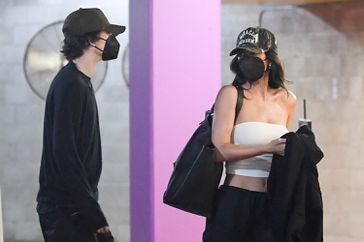 Still going strong! Kylie Jenner and actor TimothÃÂ©e Chalamet keep a low profile with baseball caps and face masks on as they are spotted heading to the Grauman's Chinese Theatre to watch a movie on romantic date night in Los Angeles.