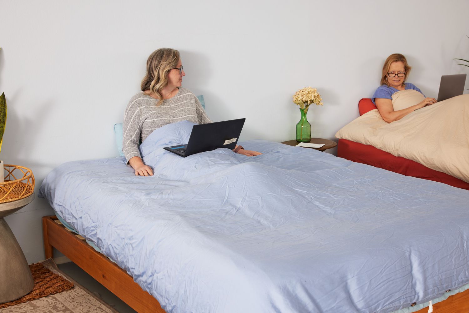 A person laying down in the Sijo AiryWeight Eucalyptus Duvet Cover