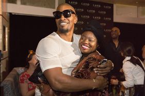 Jamie Foxx makes a toast for his sister Deidra's birthday at the National Hotel