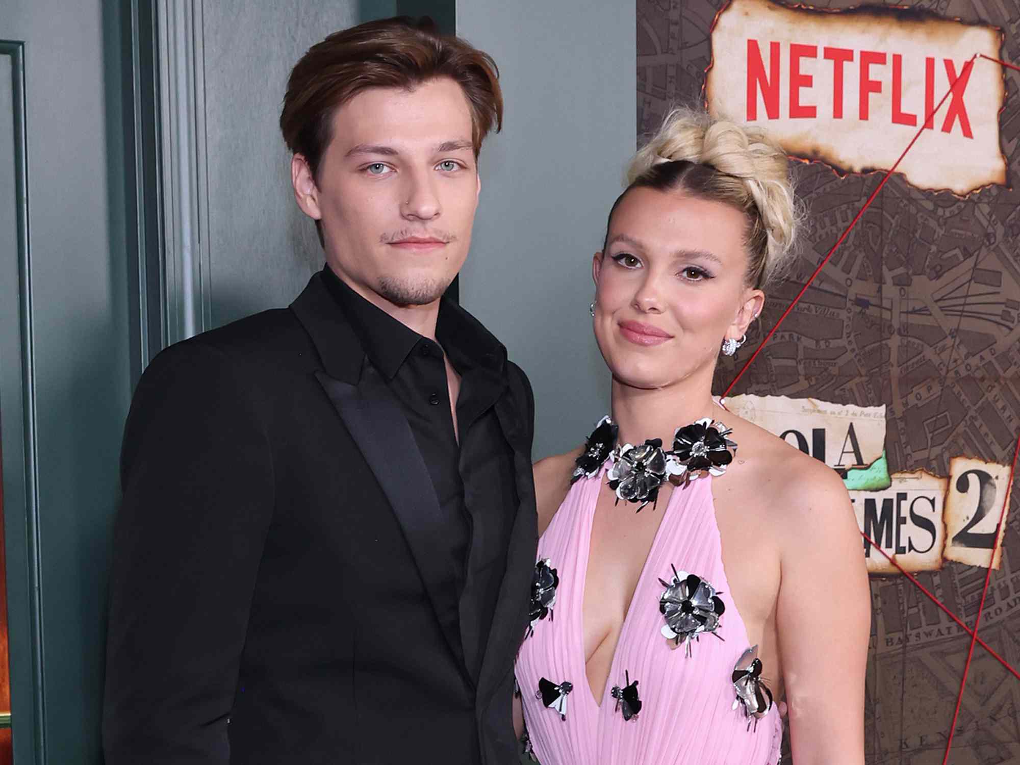 Jake Bongiovi and Millie Bobby Brown attend the Netflix Enola Holmes 2 