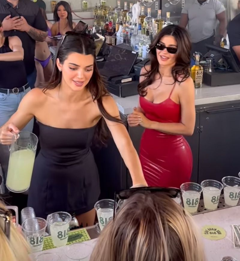 Kylie Jenner and Sister Kendall Pose in Chic Dresses at Vodka Soda Drink Event