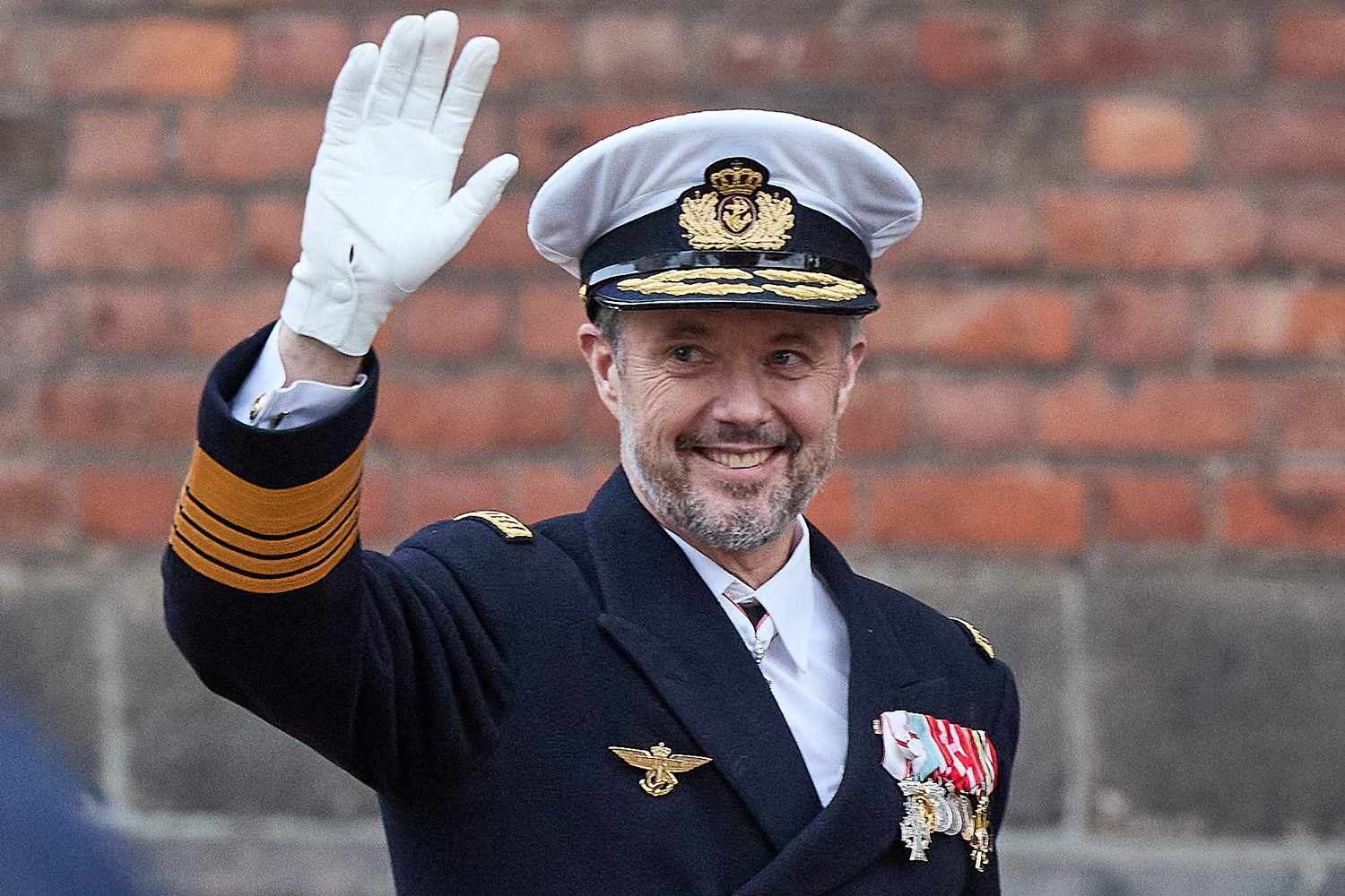 King Frederik X greets the crowd after a church service on the occasion of the change of throne in Denmark, in Aarhus Cathedral, on January 21, 2024.