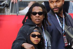 Jay-Z and Blue Ivy Carter attend the Super Bowl LVII Pregame at State Farm Stadium on February 12, 2023 in Glendale, Arizona.