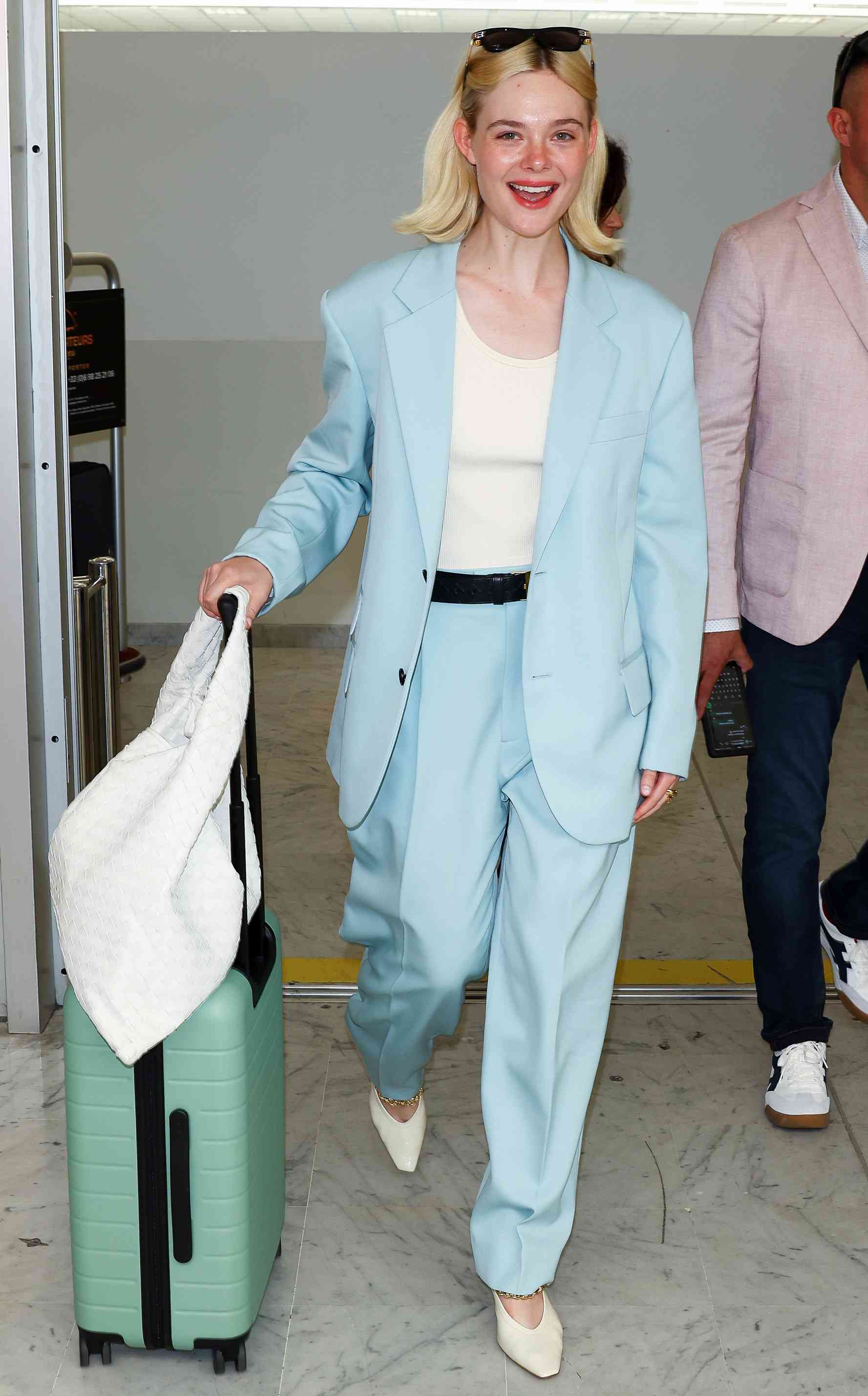 Elle Fanning is seen at Nice Airport during the 77th Cannes Film Festival on May 23, 2024 in Nice, France.