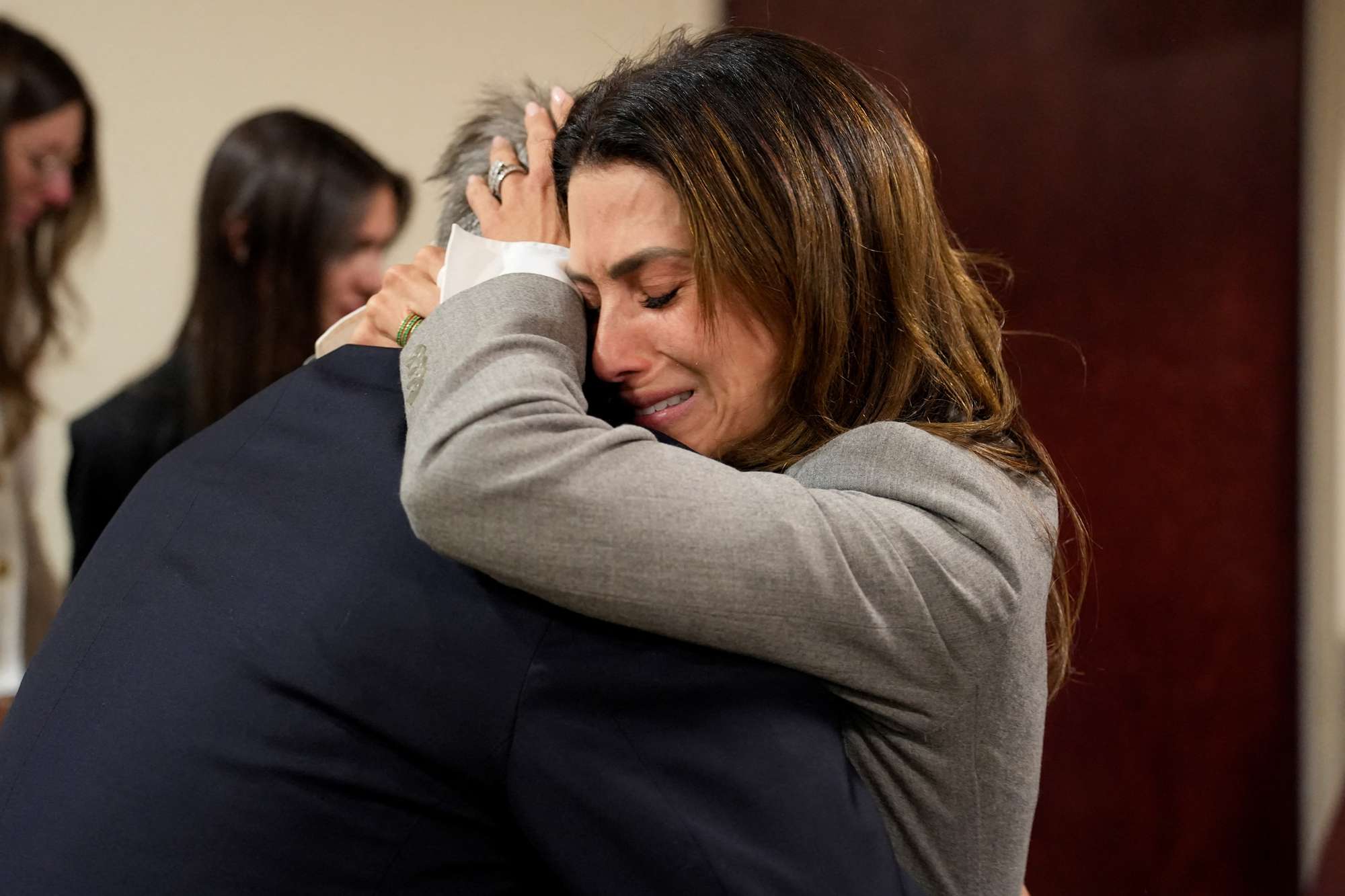 Alec Baldwin and his wife Hilaria Baldwin embrace