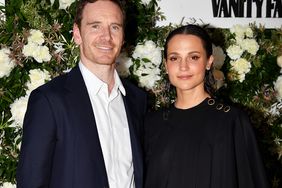 Michael Fassbender and Alicia Vikander attend the Vanity Fair x Louis Vuitton dinner during the 75th annual Cannes Film Festival. 