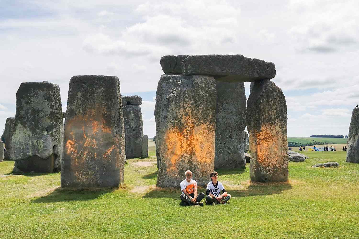 Stonehenge covered in orange paint by Just Stop Oil.