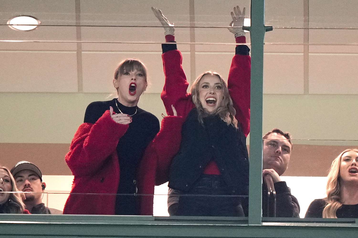 Taylor Swift, left, and Brittany Mahomes react during the second half of an NFL football game between the Kansas City Chiefs and Green Bay Packers