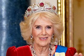 Britain's Queen Camilla (L) and Britain's King Charles III (R) welcome South Korea's President Yoon Suk Yeol and his wife Kim Keon Hee during a State Banquet at Buckingham Palace 