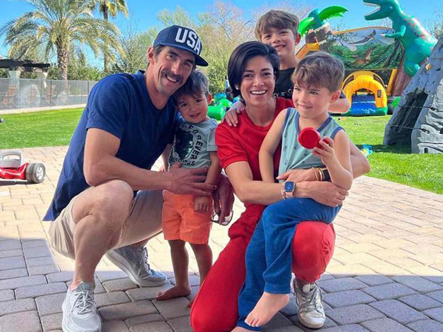 Michael Phelps and Nicole Phelps with their kids, Boomer, Beckett and Maverick 