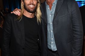 Musicians Taylor Hawkins and Chad Smith attend Heifer International's 3rd Annual "Beyond Hunger: A Place At The Table" Gala at Montage Beverly Hills on August 22, 2014 in Beverly Hills, California