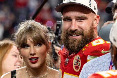 LAS VEGAS, NEVADA - FEBRUARY 11: Travis Kelce #87 of the Kansas City Chiefs and Taylor Swift react as they see Mecole Hardman Jr. #12 of the Kansas City Chiefs following the NFL Super Bowl 58 football game between the San Francisco 49ers and the Kansas City Chiefs at Allegiant Stadium on February 11, 2024 in Las Vegas, Nevada.