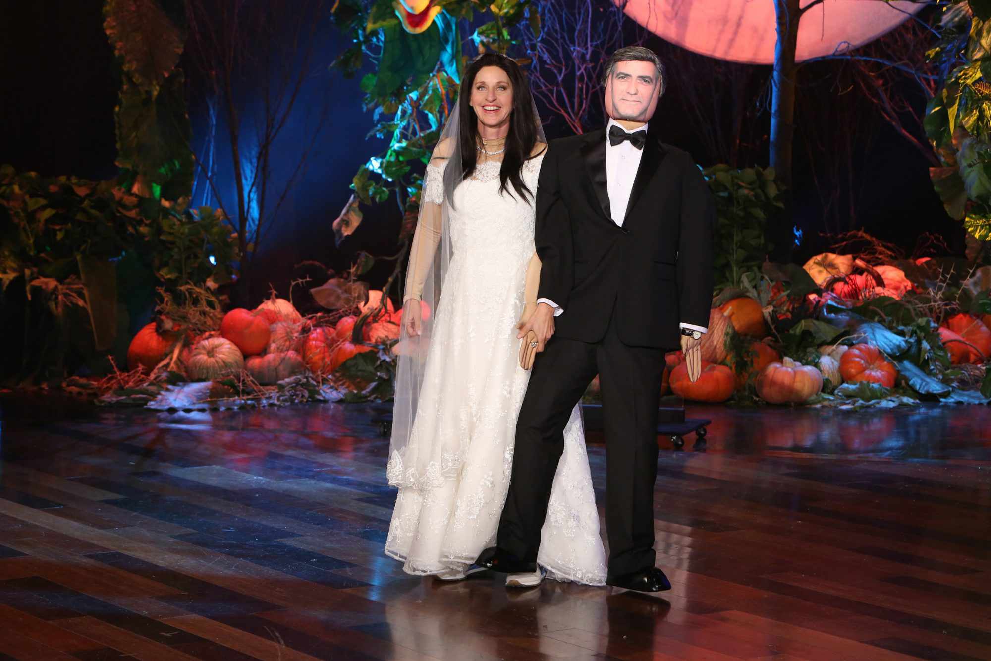 Ellen DeGeneres dressed as Amal Alamuddin and George Clooney for Halloween