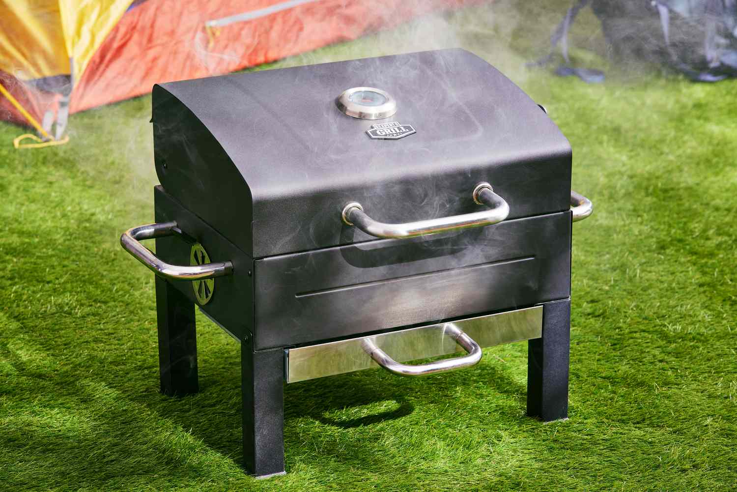 Expert Grill Premium Portable Charcoal Grill displayed on grass