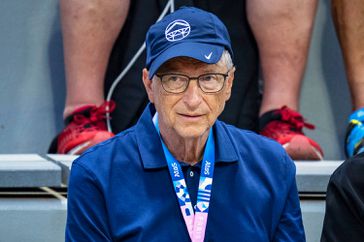 Bill Gates is seen in the stands during the Men's Singles First Round match between Alexander Zverev of Germany and Jaume Munar of Spain on day two of the Olympic Games Paris 2024 at Roland Garros on July 28, 2024 in Paris, France