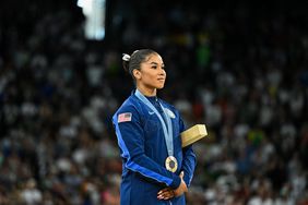 Bronze medallist US' Jordan Chiles poses during the podium ceremony for the artistic gymnastics women's floor exercise event of the Paris 2024 Olympic Games at the Bercy Arena in Paris, on August 5, 2024.